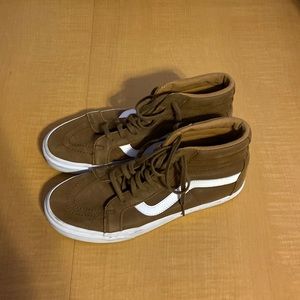 Brown high top vans